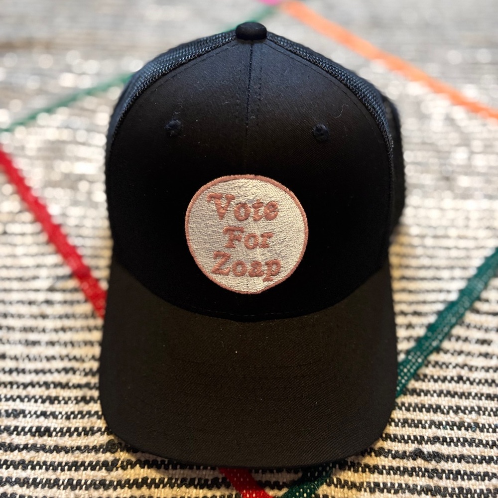Deep East Black Trucker Hat with Vote For Zoop Patch